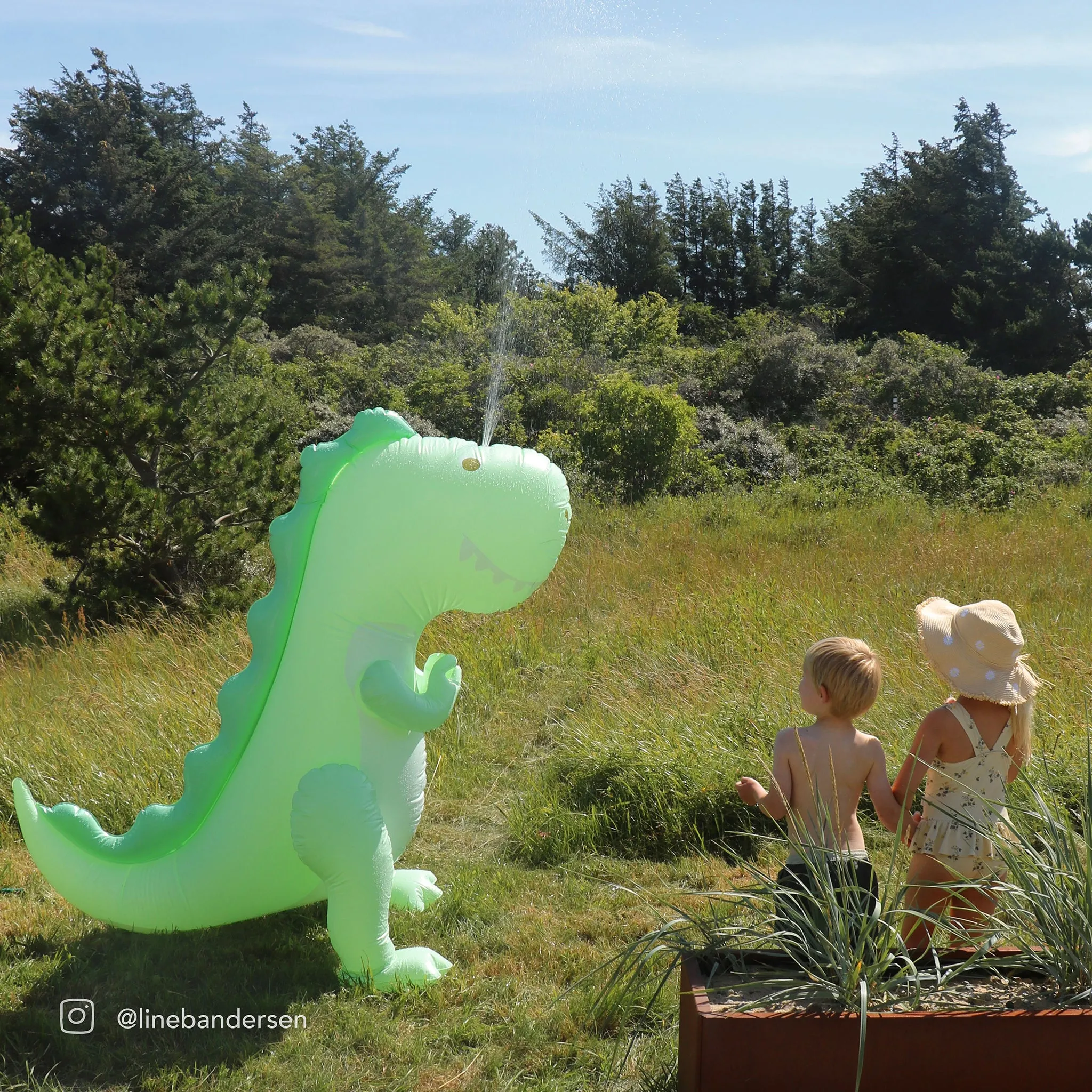 Inflatable Giant Sprinkler | Surfing Dino Sunnylife