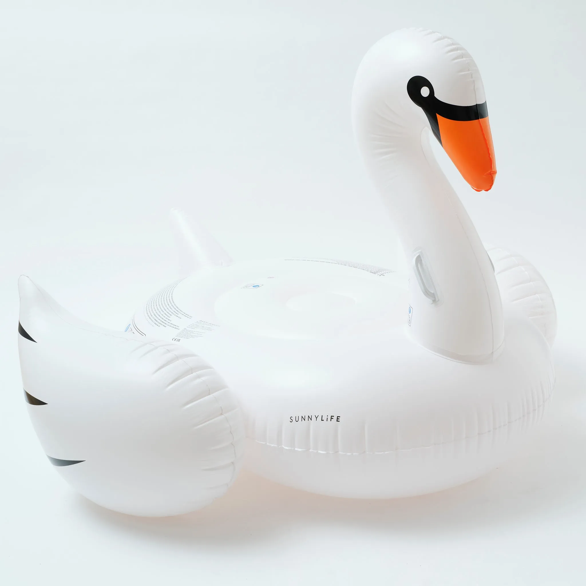 Original Luxe Ride-On Float Swan | The Resort White on White Sunnylife
